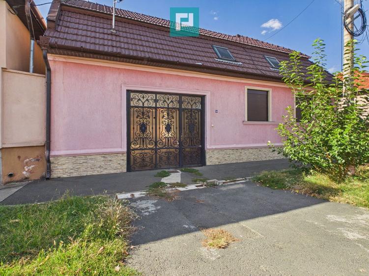 Casă individuală cu 5 camere și teren de 1.156 mp