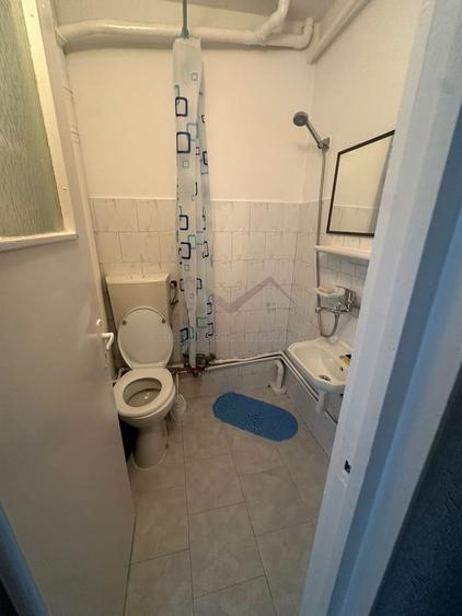 Garsoniera Alexandru etaj intermediar in bloc de apartamente