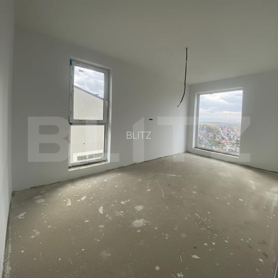 Casa pe calcan cu priveliste deschisa si compartimentare deosebita. - 8