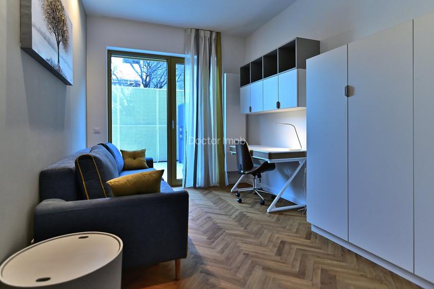 Rafinament, liniște și spațiu exterior privat în centrul Bucureștiului - 18