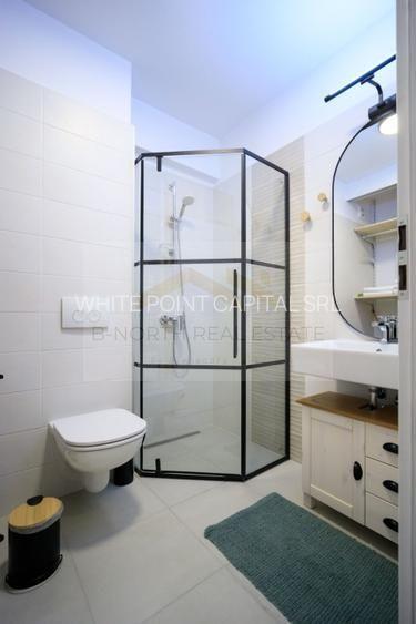 Garsonieră de închiriat, bloc 2022, etaj 10, parcare subterană inclusă - 11