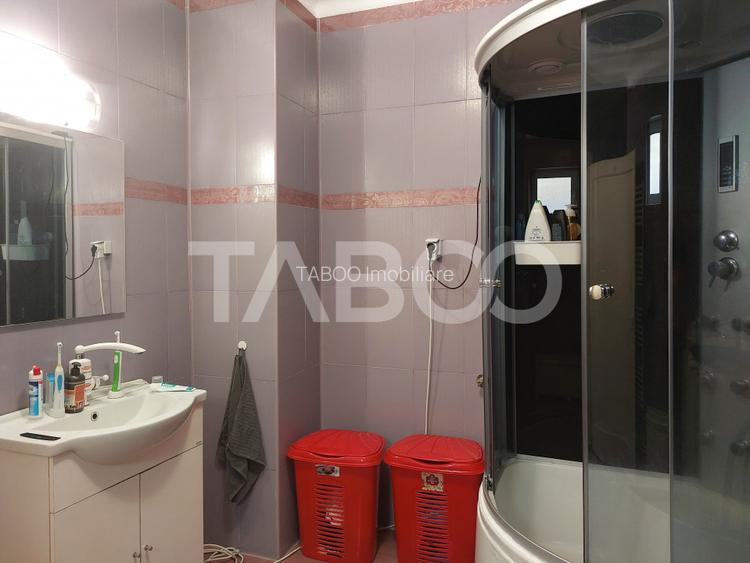 Casa 214 mp utili singur in curte 800 mp teren zona centrala Cisnadie - 22