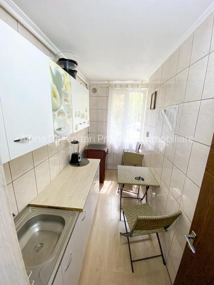 Titan, Auchan, str. Jean Steriadi, - 2