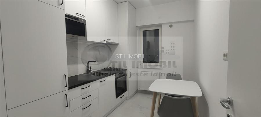 1 CAM , COMISION 50 % (225 EURO) ,CENTRU, PARCARE,UNIREA TOWERS - 14