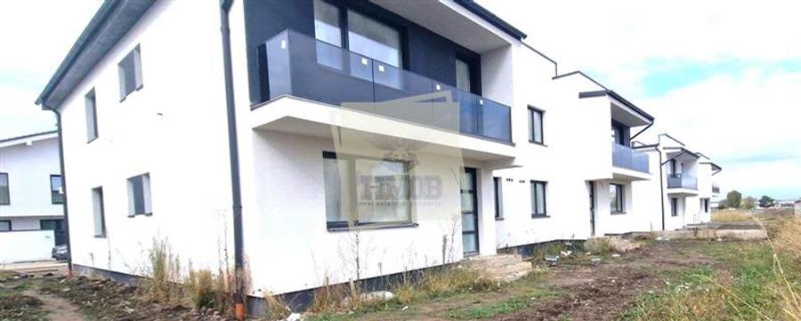 Casa la alb 2 bai 2 balcoane si curte 170 mp in Sibiu