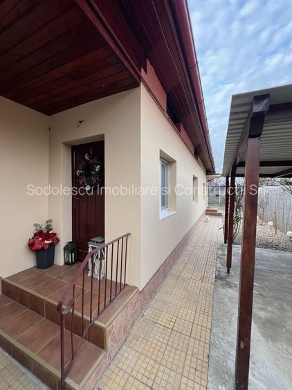 O căsuța cocheta, cu o atmosfera primitoare și calda - 5