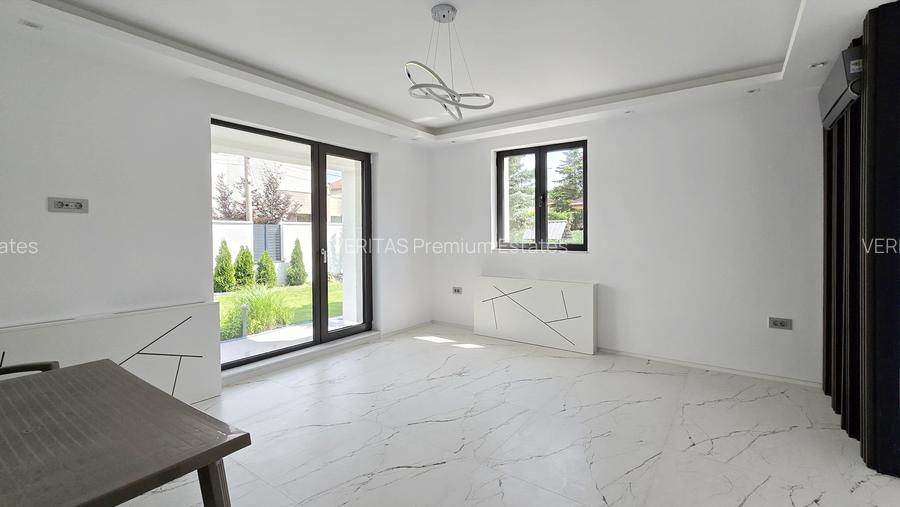 Casa superba teren 1000 mp, lift, 2 dormitoare parter, spatii ample, intimitate - 24