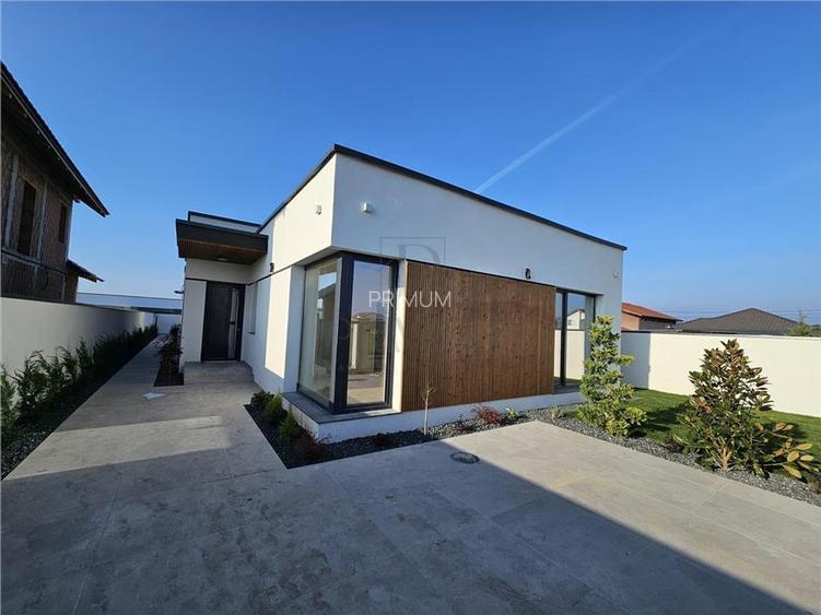 Casa individuala - finalizata - design modern - curte amenejata - 2