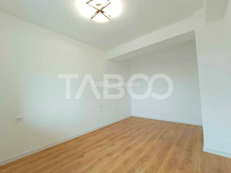 Apartament decomandat 3 camere 2 bai - bucatarie separata - parcare - 8