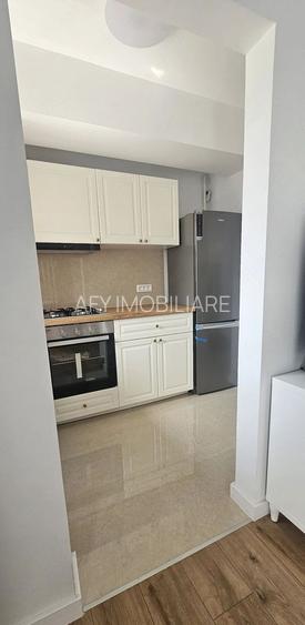 Garsoniera noua de inchiriat-zona Berceni- Centrala proprie - 3