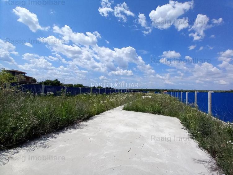 Teren intravilan 1187 mp , strada asfaltata , utilitati  - 6