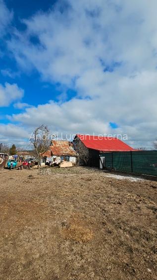 Teren intravilan 860 mp, deschidere 14,27 m, utilități - 3