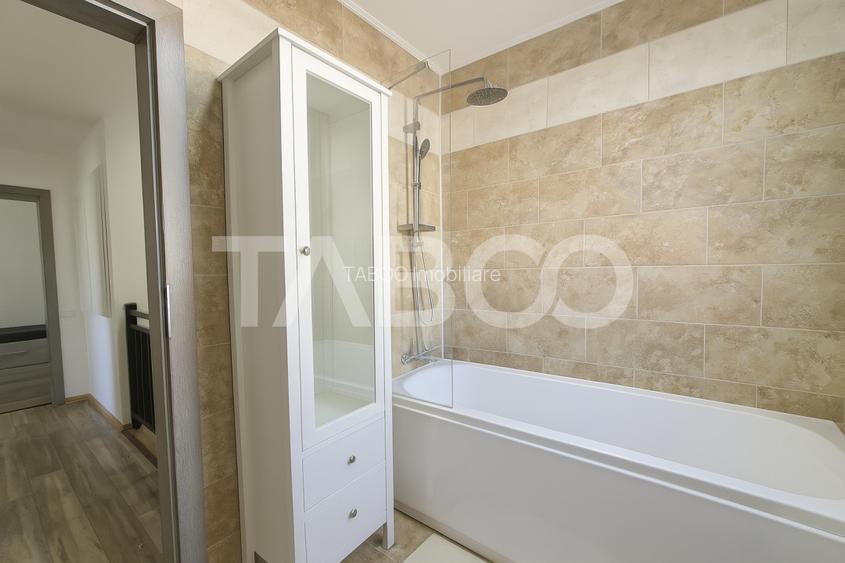 Casa de vanzare in Zavoi cu 3 camere 2 bai curte libera de 50 mp - 15