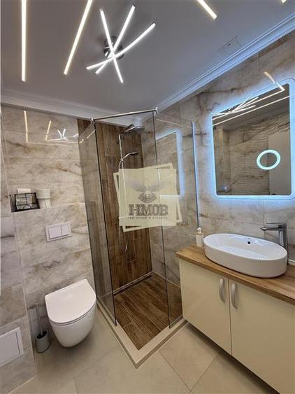 Apartament nou 3 camere 80 mpu 2 bai balcon parcare subterana