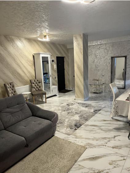 Apartament 59 mp utili+terasa de 18 mp,parcare subterana,centru Gilau