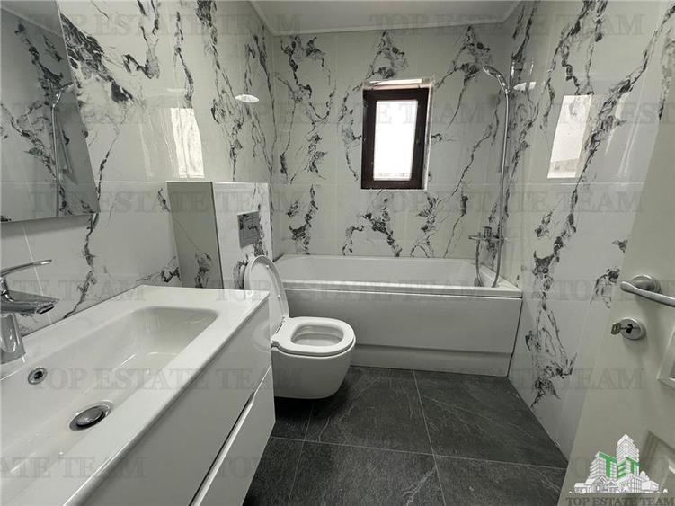 Apartament 2 camere si curte de vanzare Damaroaia