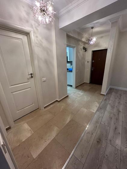 Apartament 2 camere si curte Damaroaia