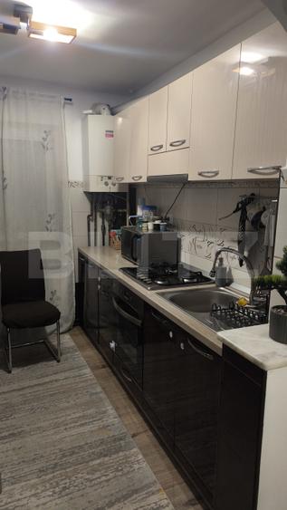 Apartament 3 camere, decomandat, 60mp. Parter inalt, zona Burdujeni, Comlemn