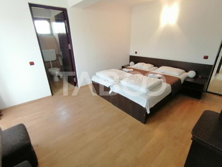 Pensiune 13 camere 16 bai sauna piscina si teren 1565 mp Cisnadioara - 13