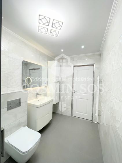 Apartament cu 3 camere de vanzare, cu gradina si parcare, Floresti - 11