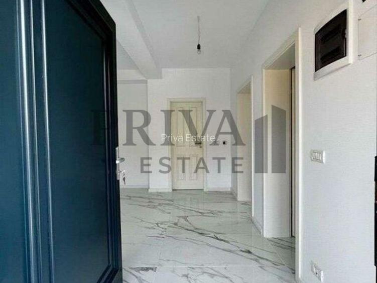 1/2 Duplex 124 mp utili + 330 curte. Dormitor parter,Bucatarie închisă - 11