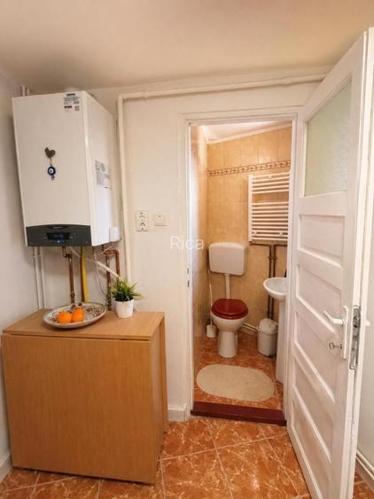 Casă cu 2 locuințe, centrală, garaj și grădină, teren 415 mp, Mezeș/Șos Chitilei - 11