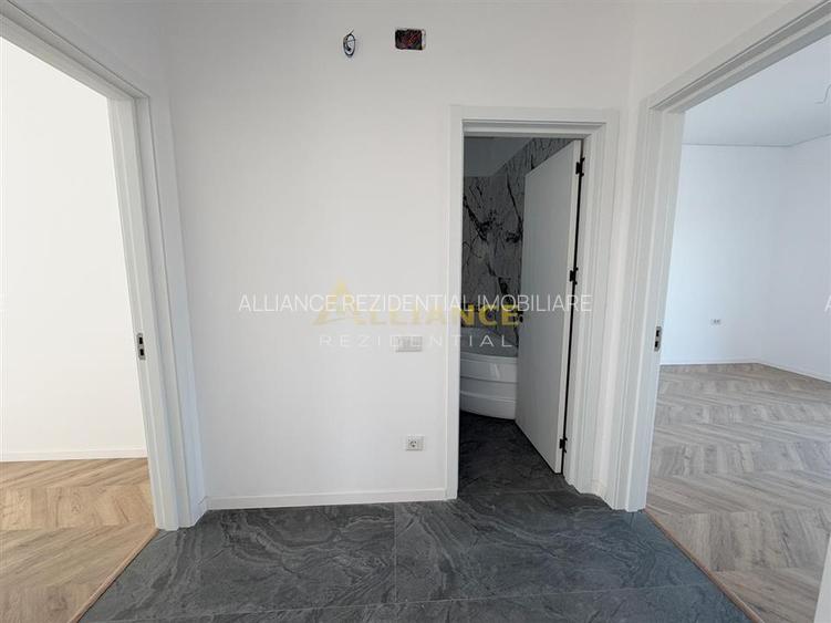 Casa individuală parter - 4 camere - 2 băi + dressing - teren 371mp - 4