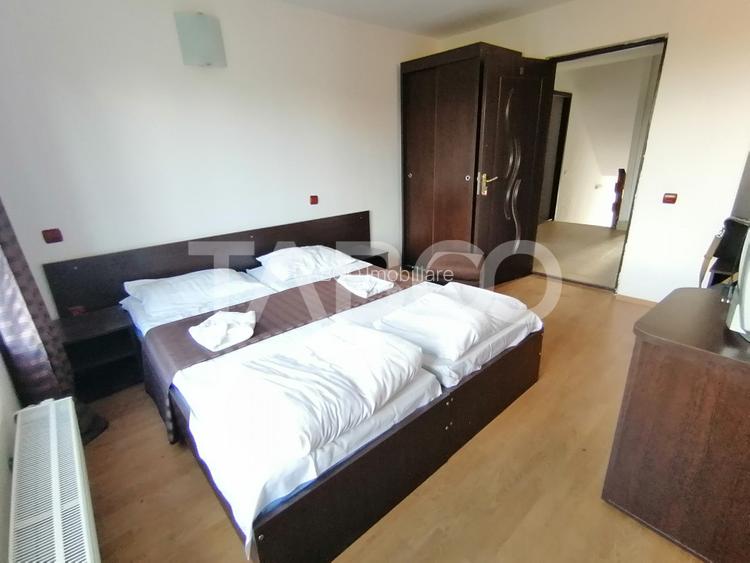 Pensiune 13 camere 16 bai sauna piscina si teren 1565 mp Cisnadioara - 29