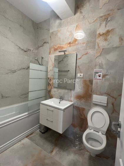 De inchiriat- Apartament nou - 14