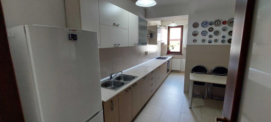 Decomandat,121mp utili+terasa,et 1/5,2 loc parcare subteran si suprateran,mobila