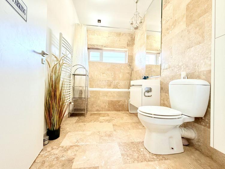 Apartament generos -curte proprie - garaj - 26