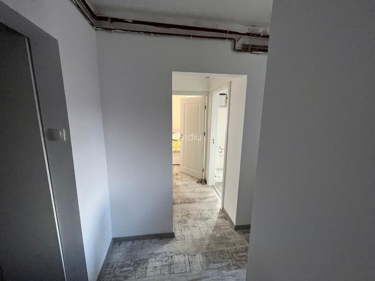 Apartament cu 3 camere, 2 băi, 66 mp + 4 mp balcon, decomandat, etaj 2/4 - 6