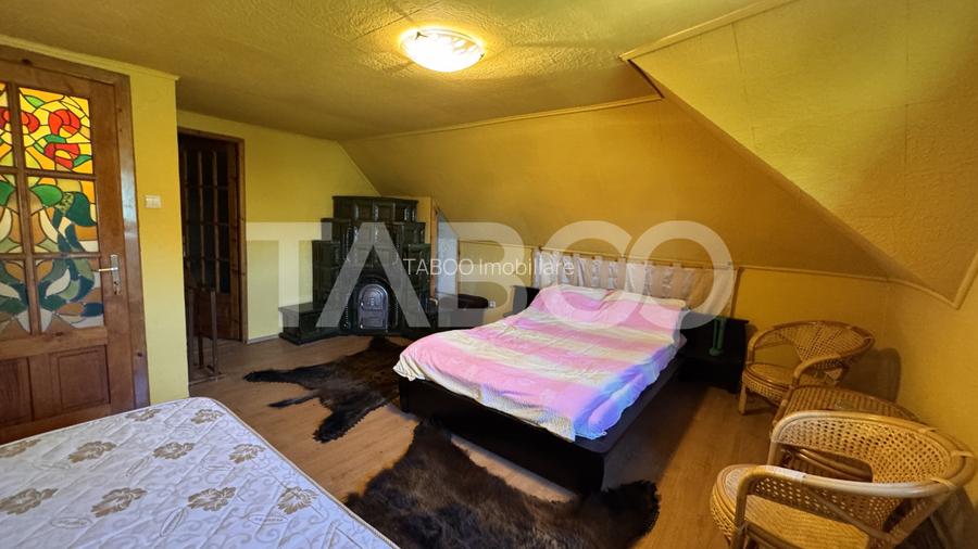 Casa de vanzare 6 camere loc de relaxare garaj teren 669 mp Cornatel - 12