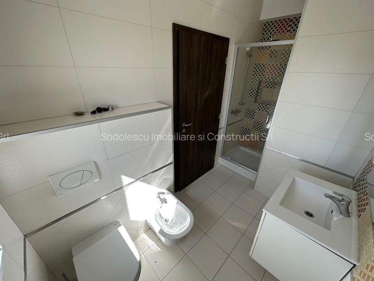 CASA SPATIOASA  CU GARAJ SI TEREN DE 600 MP - 16