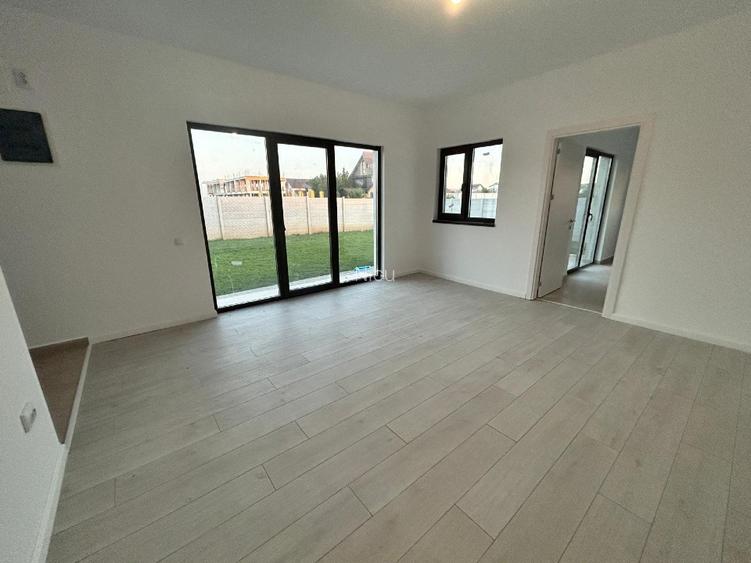 Casa individuala 3 camere,2 bai,o bucatarie,beci incalzire pardoaseala teren 450 - 5