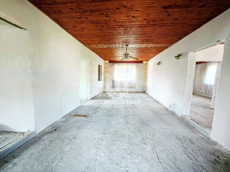 Casă P+1 cu 8 camere 492 mp teren 21 ml deschidere comision 0% - 17