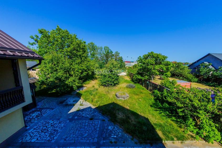 Casă cu 7 camere, 10 ari de vânzare la drumul principal cu 2 intrari - 28