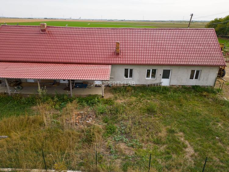 Casă cu teren 13 418 mp intravilan