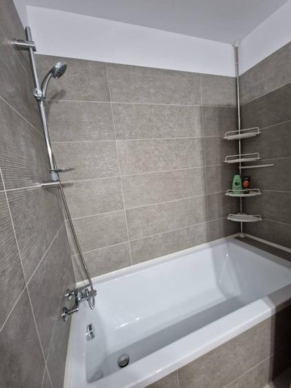 Apartament în bloc nou, cu parcare subterană.