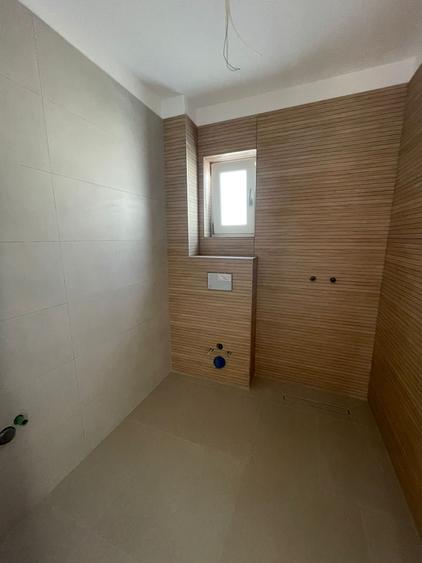 Casa individuala cuplata de vanzare