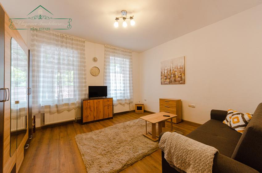 Apartament, grădină proprie de 200 mp și centrală pe gaz, zona Pârneava, Arad