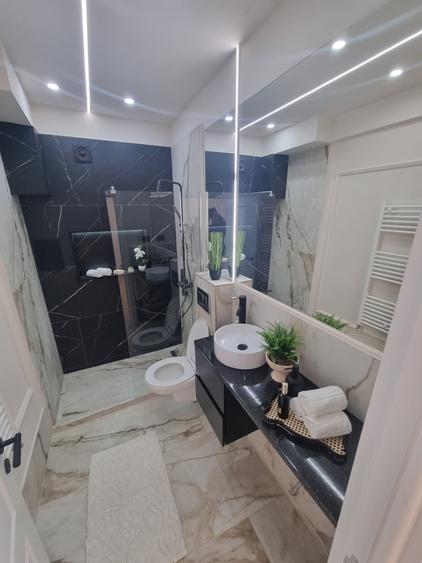 Apartament cu 2 camere,ultrafinisat ,zona centrală