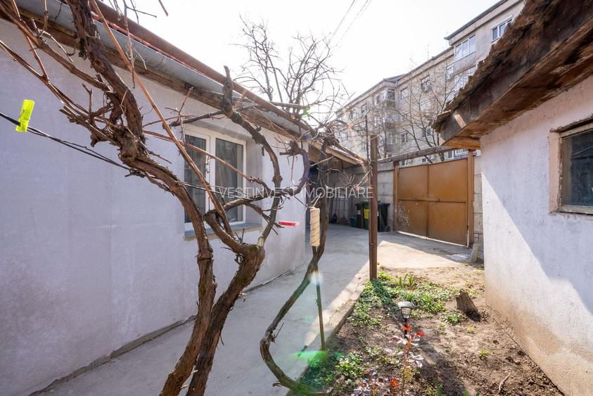 Casa cu 300 mp de teren , acces auto si dublu front in Nufarul - 12