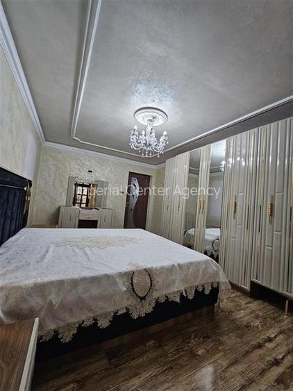 APARTAMENT CU 2 CAMERE DE VANZARE IN ZONA DE SUS,PARTER IN ONESTI - 2