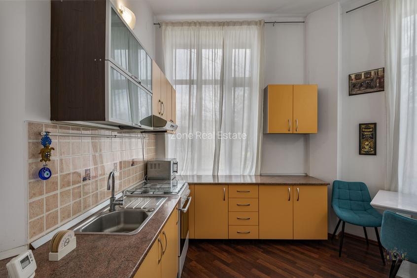 Business cu identitate: Apartament Unirii , demisol, parter si curte accesibila - 12