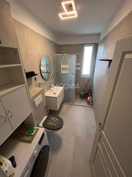 Nou. 57 mp utili.  Mobilat si utilat. Asfalt. Zona Braytim - pozitie excelenta - 11