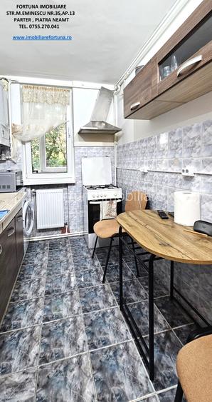 Apartament 2 camere,parter+balcon mare+boxa in proprietate,zona Scoala nr.8 P.Nt - 11