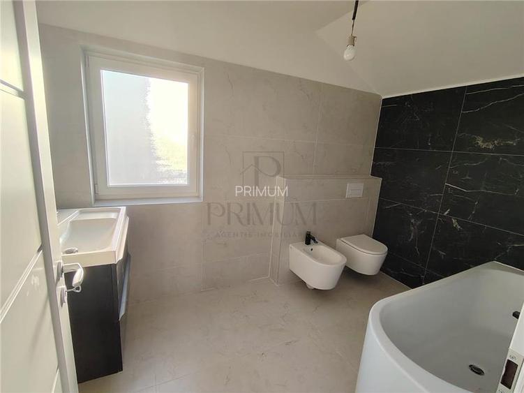 Casa individuala - spatii generoase- zona foarte buna - carport - 17