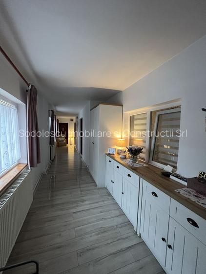 O căsuța cocheta, cu o atmosfera primitoare și calda - 2