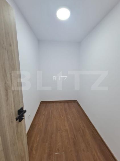 Apartament decomandat, finisaje noi, parcare subterana, zona Terra - 9